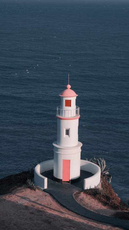 漳州火山岛粉色灯塔图片