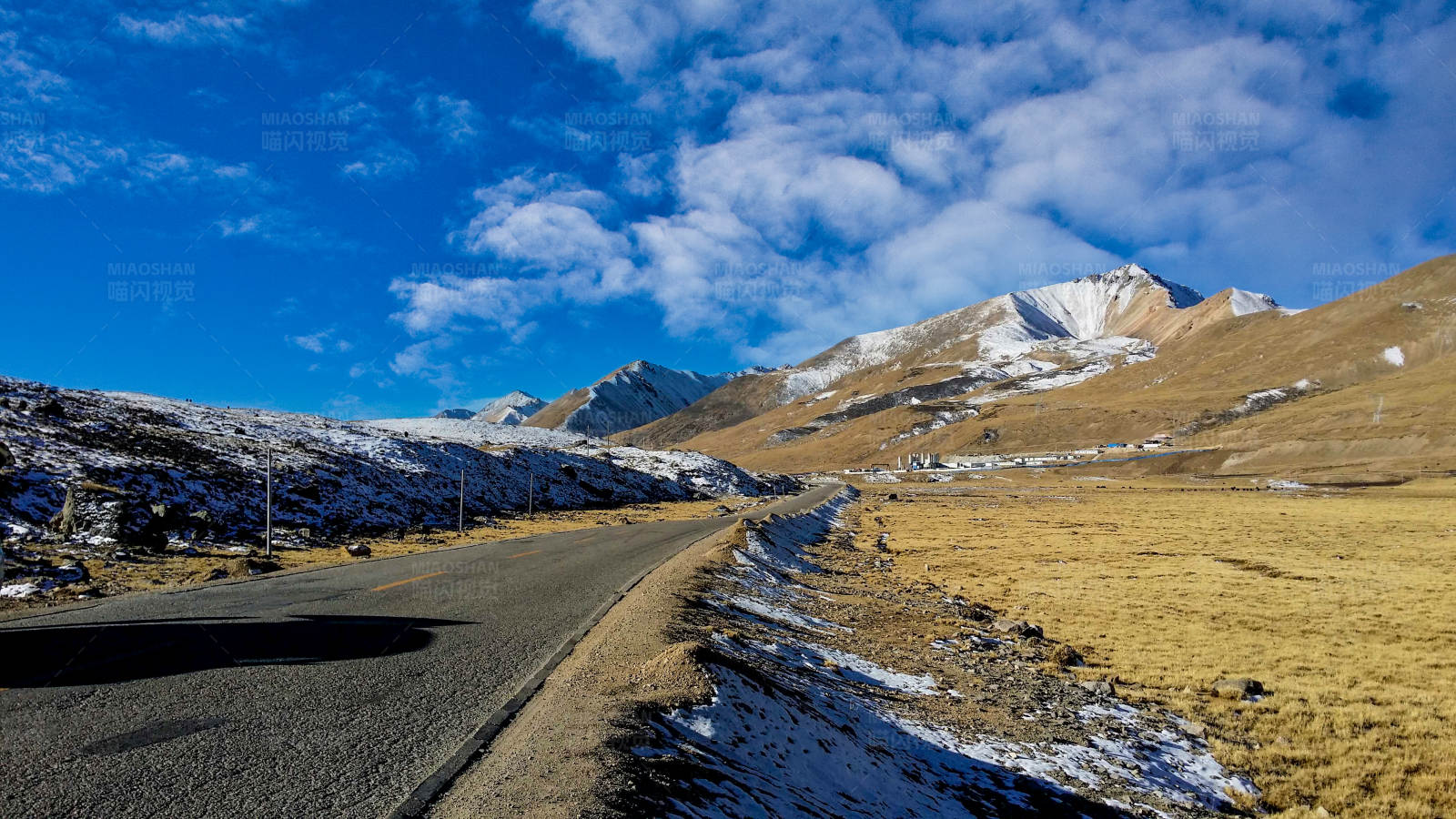 高原雪山路图片