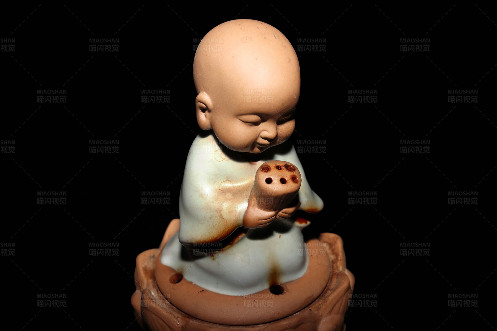 小沙弥陶瓷雕像图片