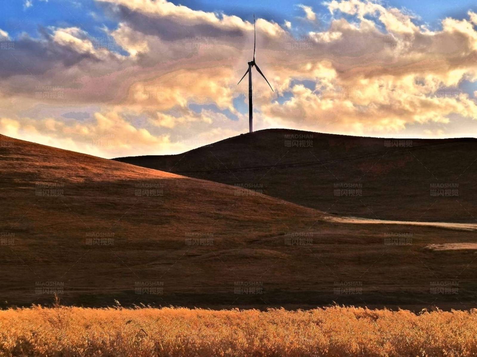 风车与夕阳图片