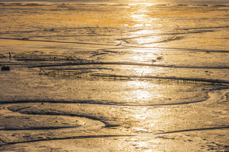 夕阳下的海滩纹理图片