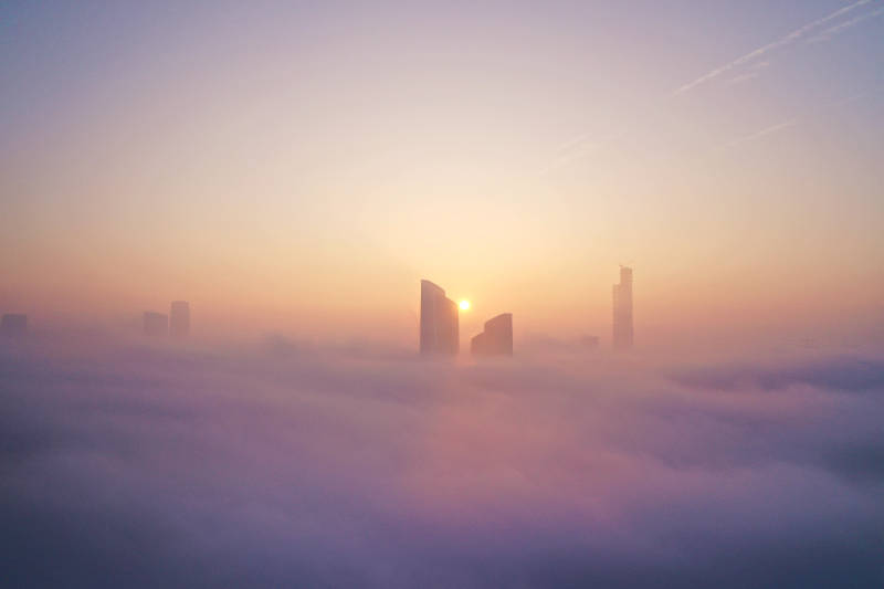 航拍日出云海中的南京保利大剧院图片