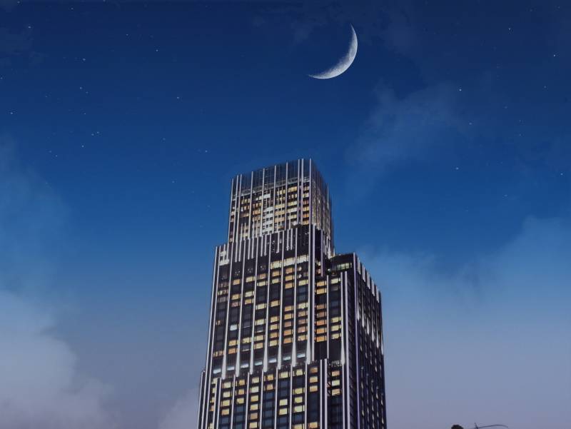 夜空下的摩天大楼图片