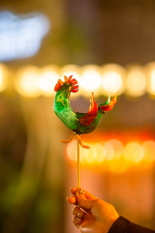 夜市上的糖画公鸡图片