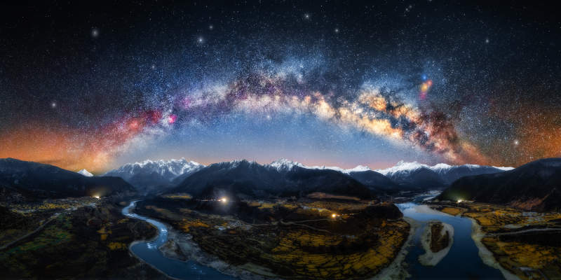 星河璀璨映雪山图片