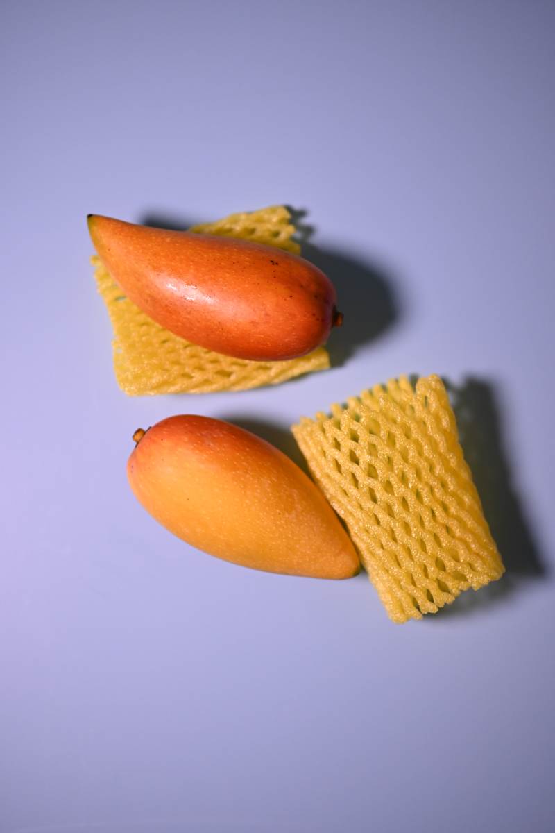 芒果与网纹垫的创意组合图片