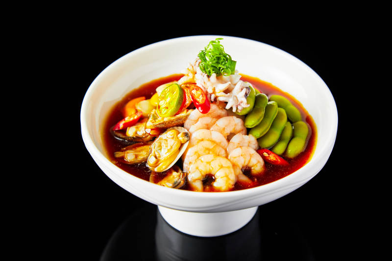 海鲜辣汤配毛豆图片