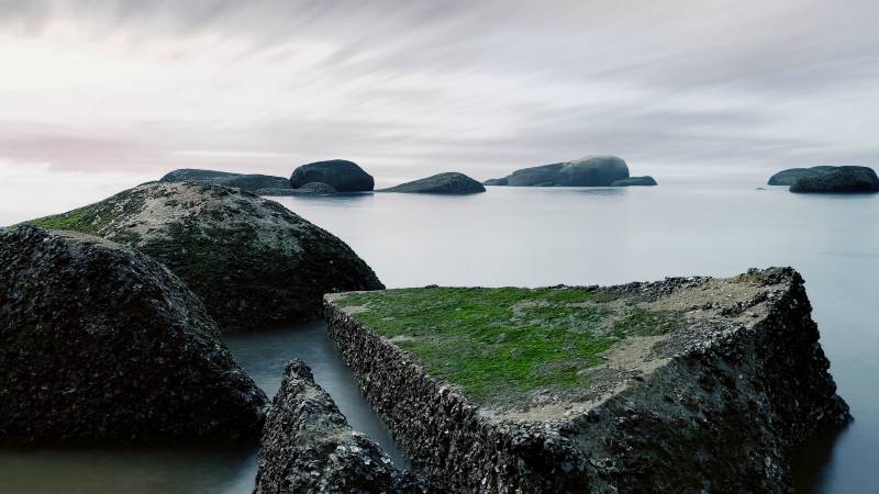海边岩石与小岛静谧景致厦门海边图片