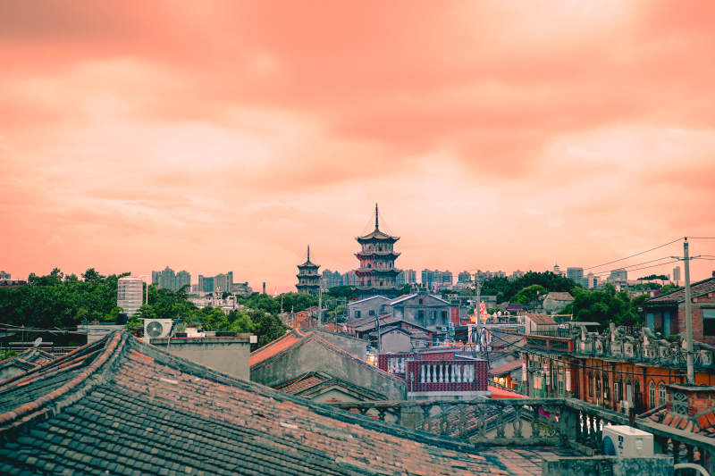 古城夕阳映塔楼  泉州双塔图片