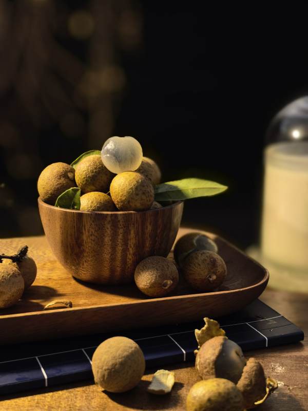 龙眼果盘静物摄影图片