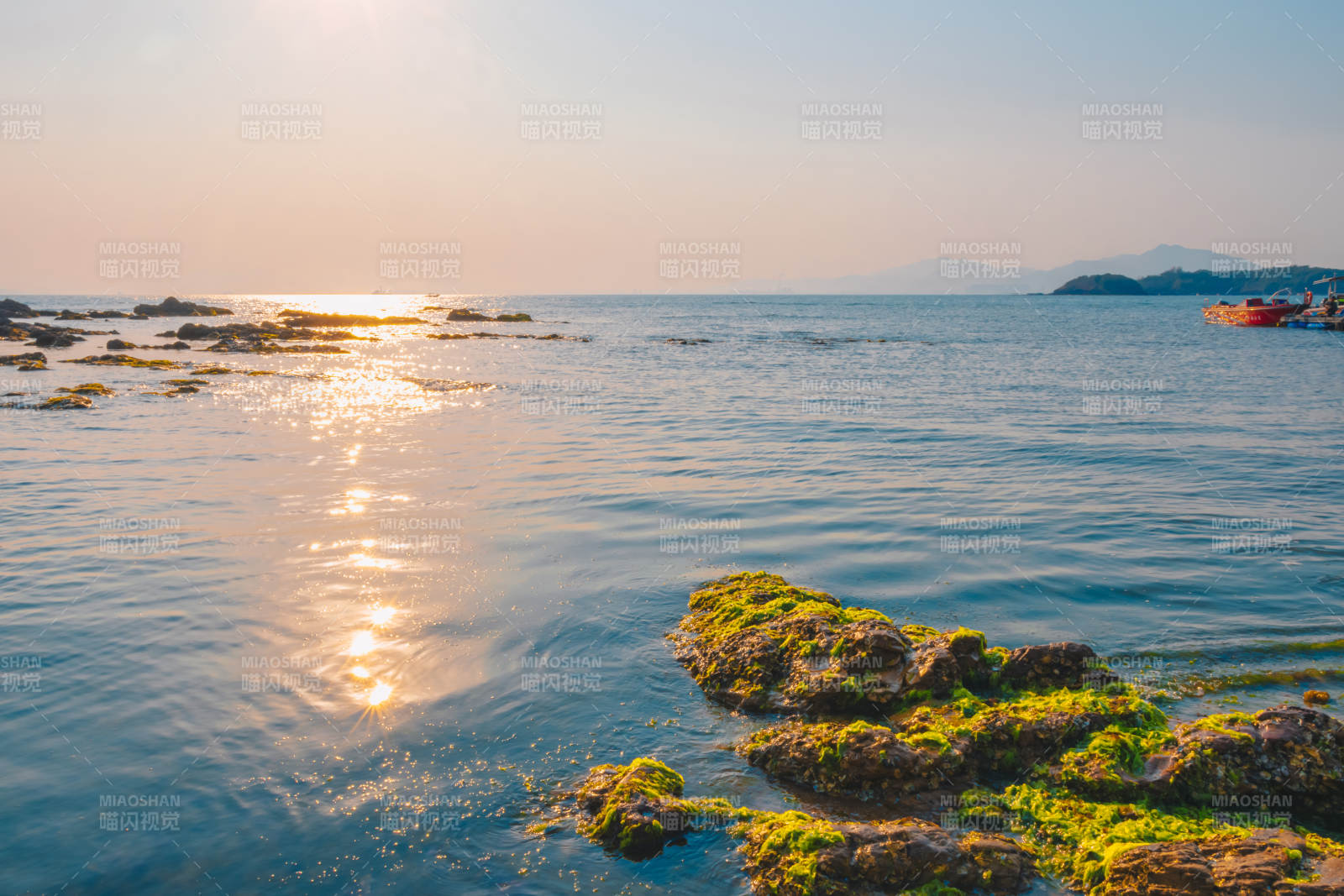 夕阳下的海滨风光图片
