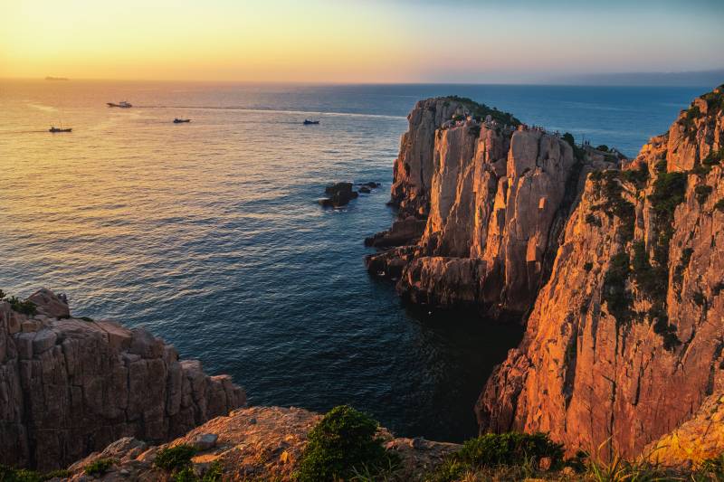 舟山悬崖日落海景图片