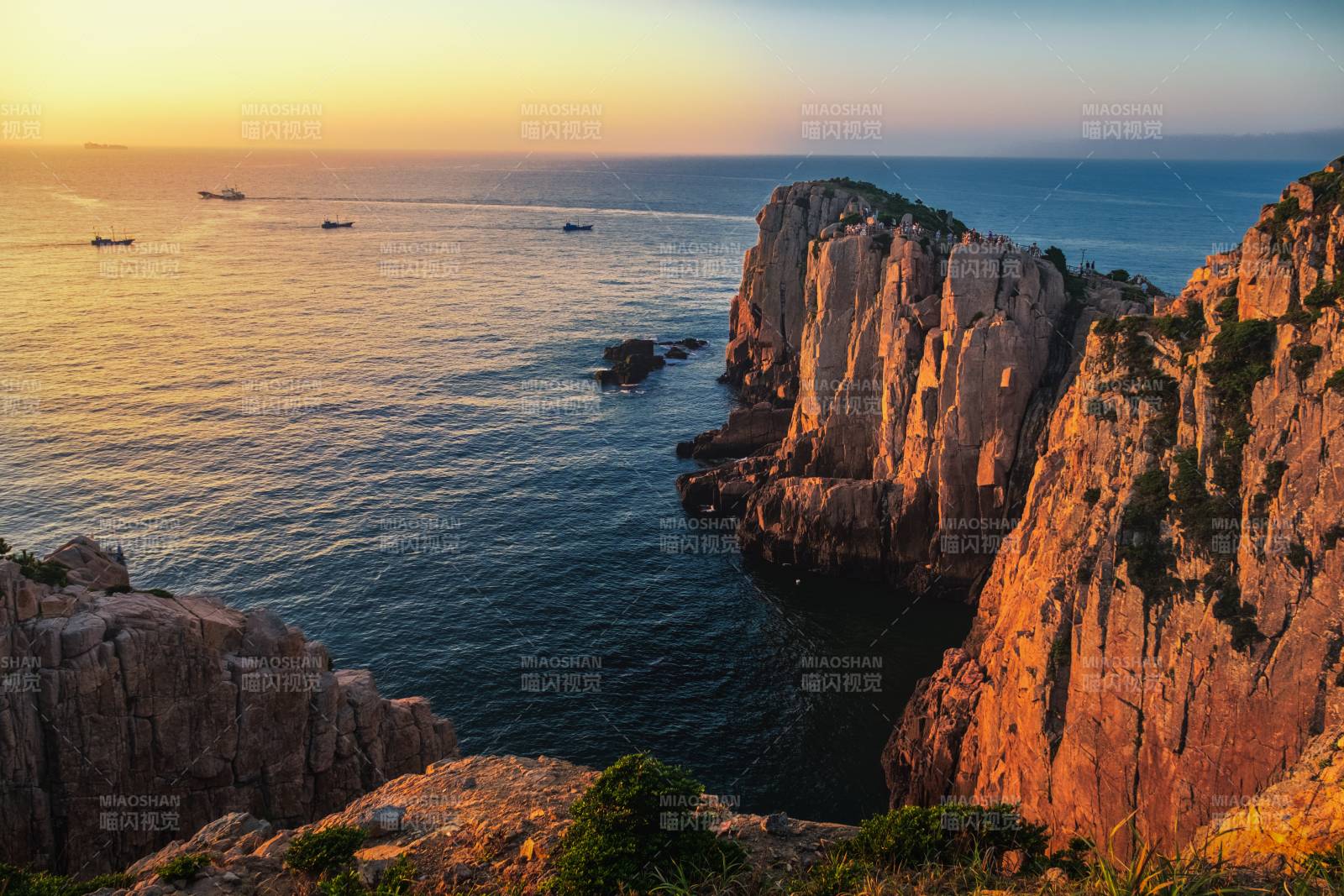 舟山悬崖日落海景图片