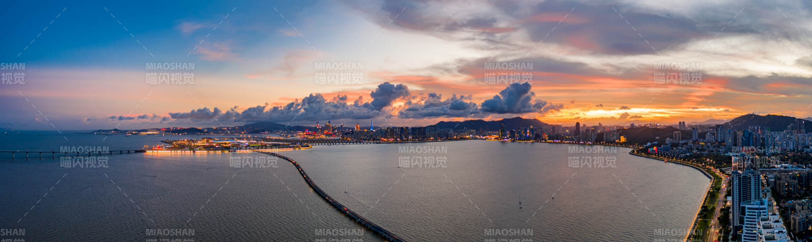 城市海岸日落美景图片