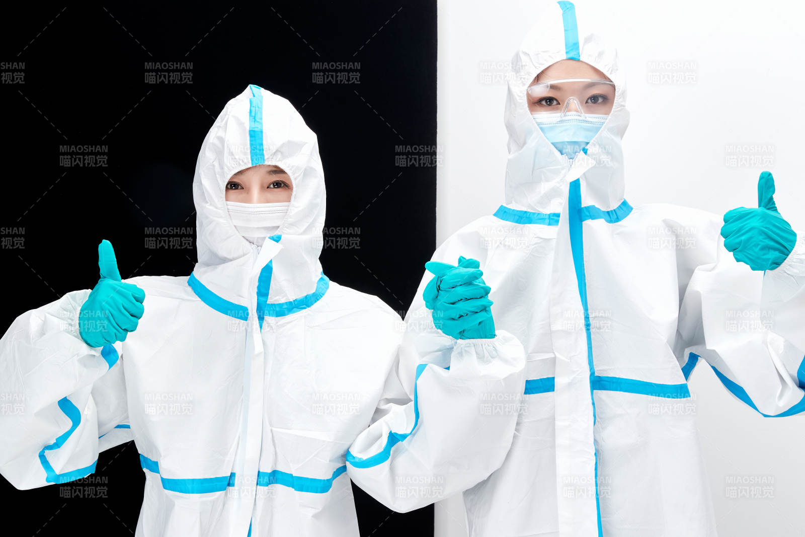 穿白色防护服佩戴护目镜口罩的防疫人员图片