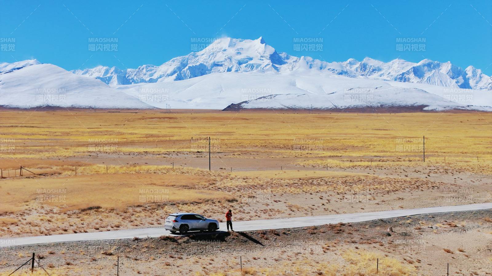 岗彭庆峰雪山下的公路之旅图片