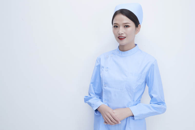 身穿蓝色护士服展示各种表情的漂亮女护士图片