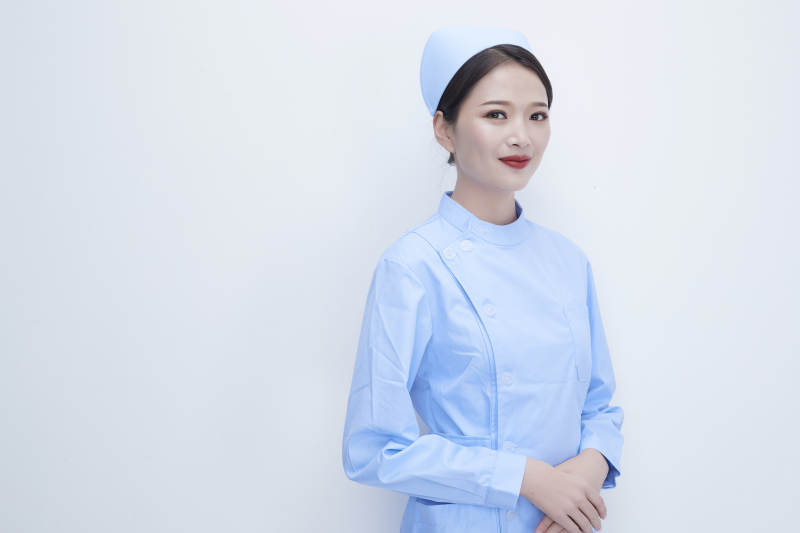 身穿蓝色护士服展示各种表情的漂亮女护士图片