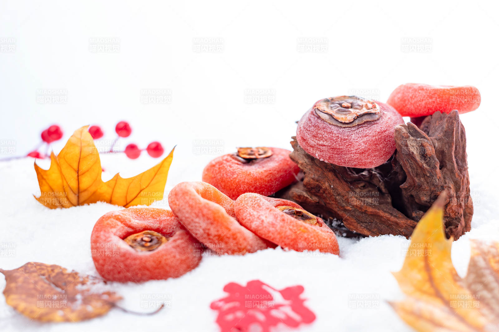 柿饼秋果雪景图片