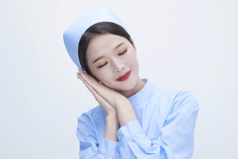 身穿蓝色护士服展示各种表情的漂亮女护士图片