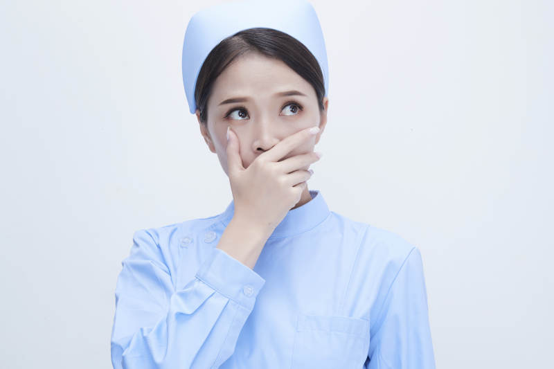 身穿蓝色护士服展示各种表情的漂亮女护士图片