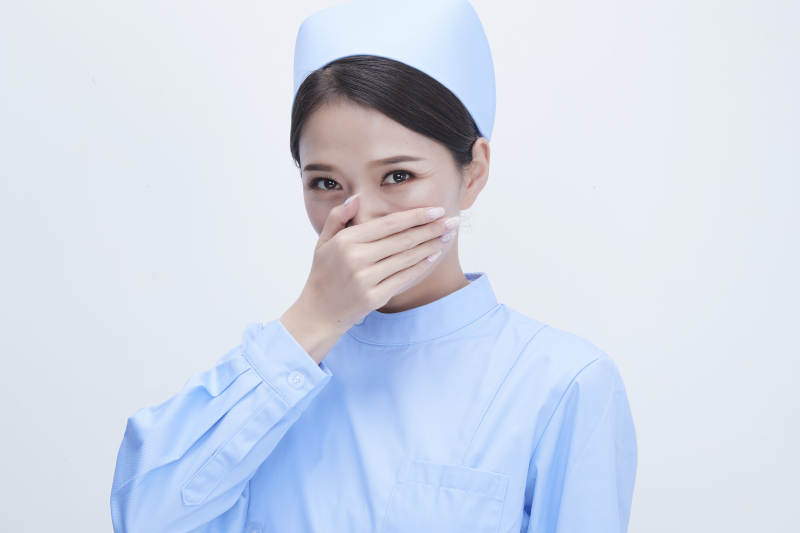 身穿蓝色护士服展示各种表情的漂亮女护士图片