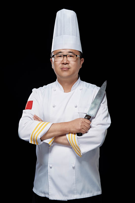 手拿厨师刀的凉菜厨师人物形象展示图片