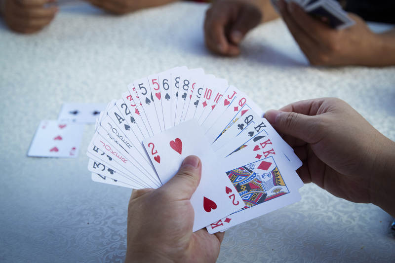 掼蛋扑克比赛现场图片