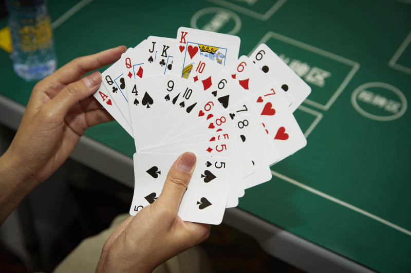 掼蛋扑克比赛现场图片