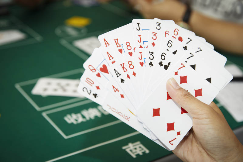 掼蛋扑克比赛现场图片