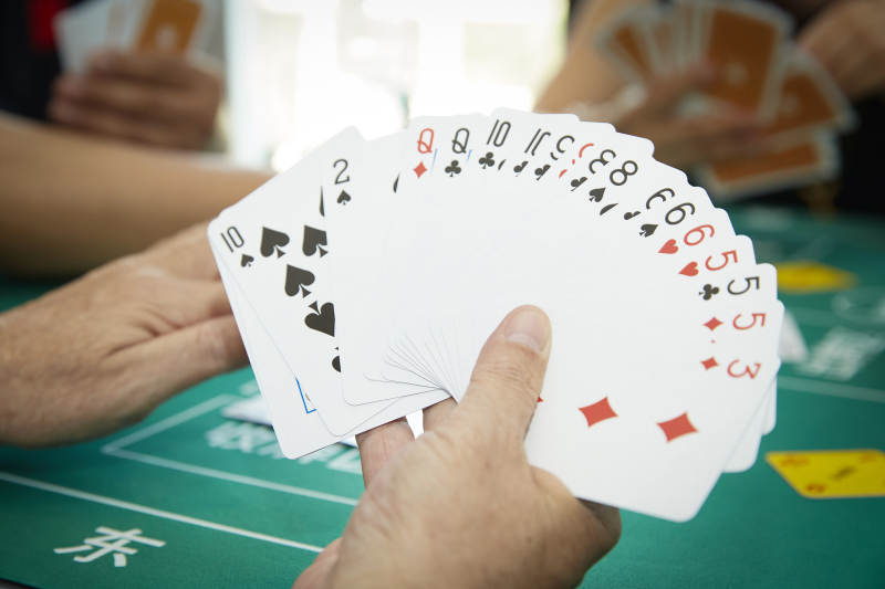 掼蛋扑克比赛现场图片