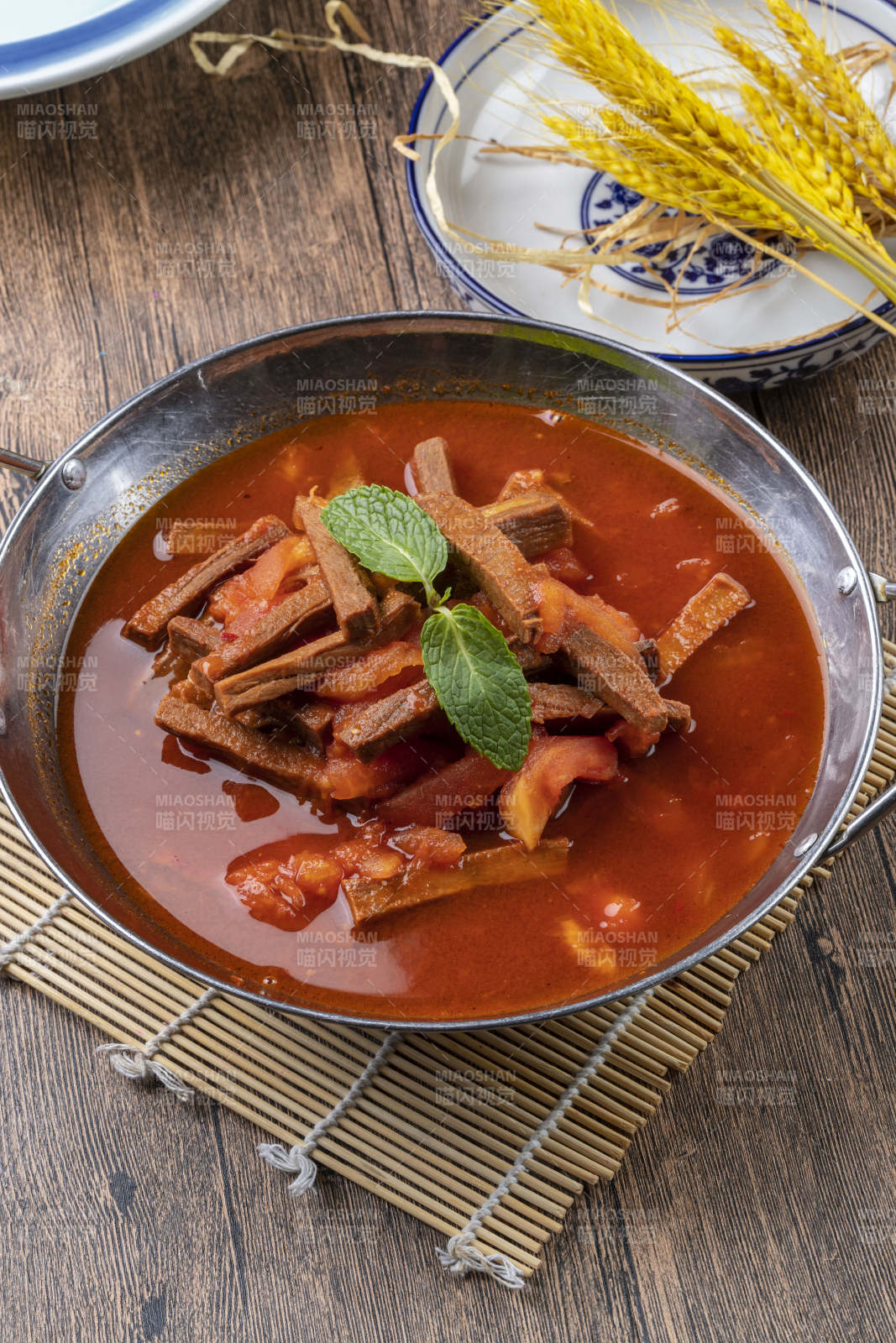 锅仔番茄牛瓜条图片