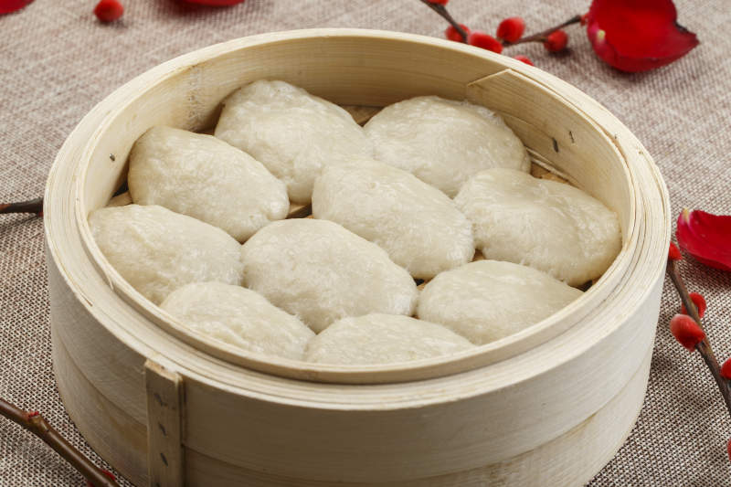 朱笼屉装的东北粘豆包图片