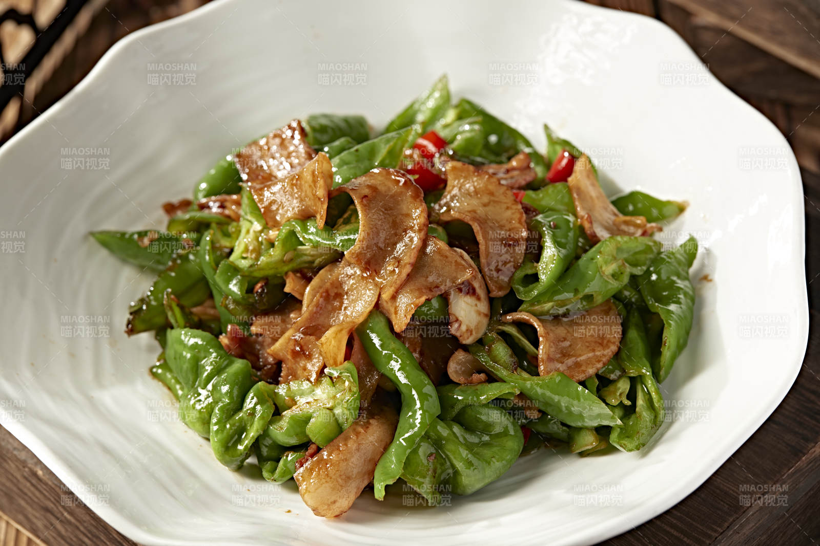 五花肉螺丝青辣椒爆炒海螺片图片