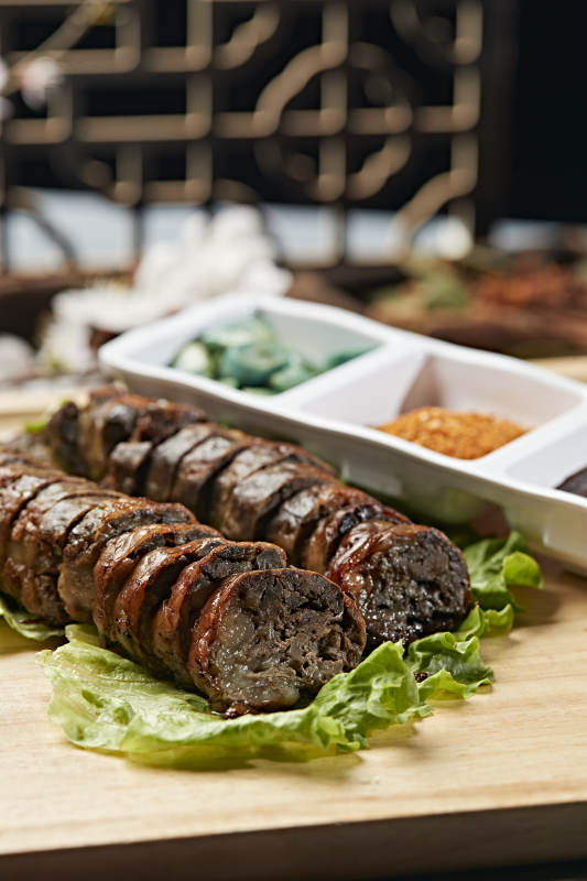 炭烤包油牛肝切片图片