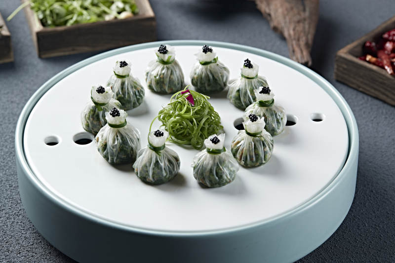 鱼籽鸡蛋野菜馅水晶石榴包图片