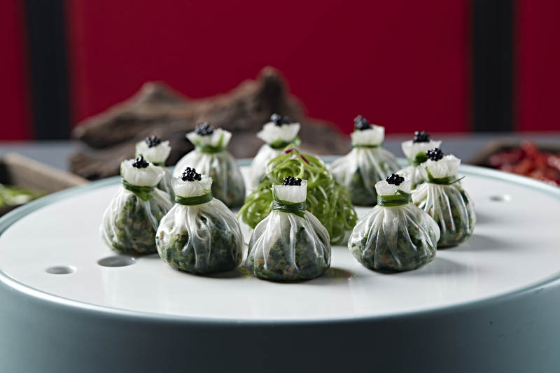 鱼籽鸡蛋野菜馅水晶石榴包图片