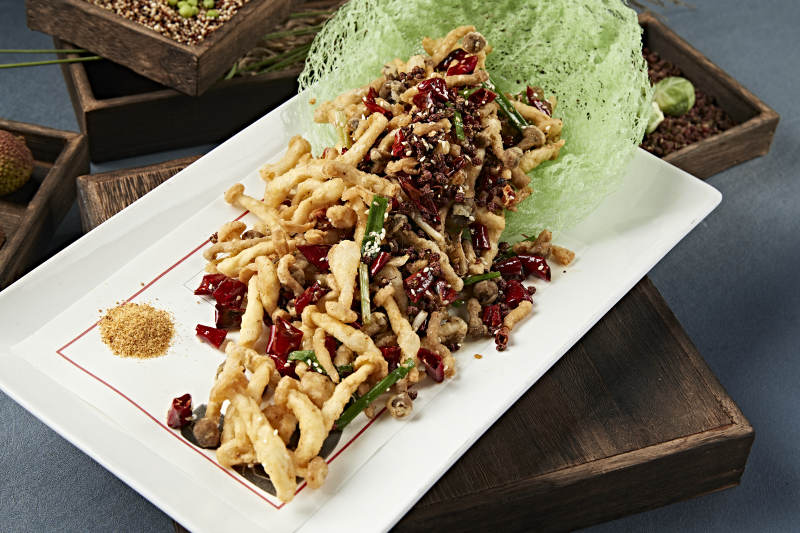 川味麻辣干炸海鲜菇图片