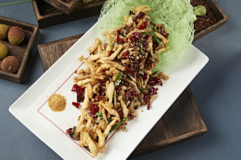 川味麻辣干炸海鲜菇图片