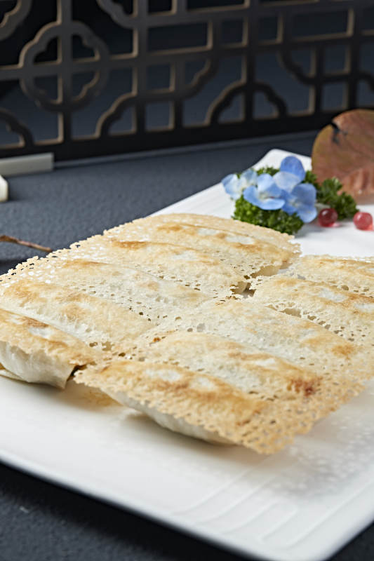 韭菜油渣馅渔网煎锅贴图片