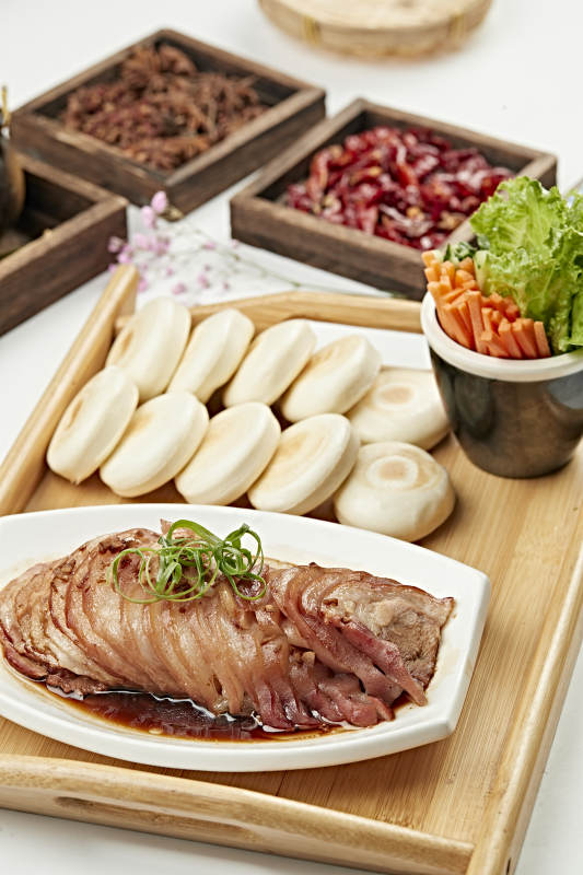 卤煮猪肘切片肉夹馍图片