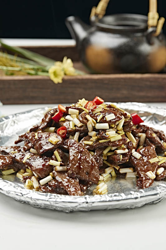 铁板葱香酱爆猪肝图片