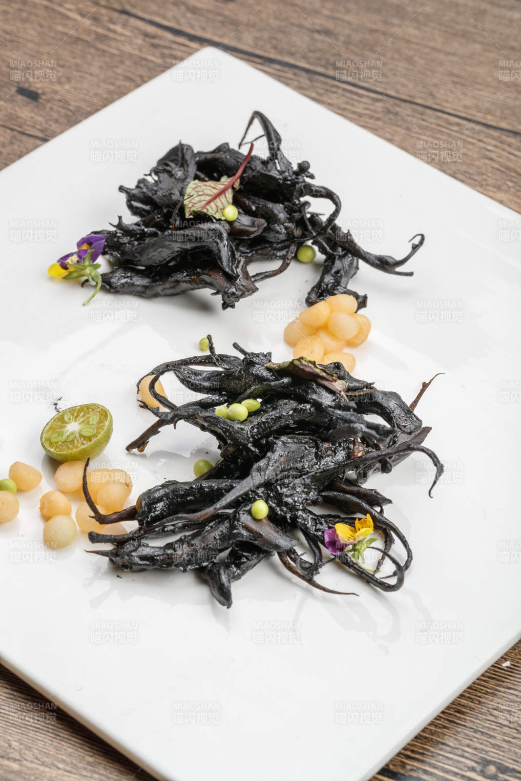 风味墨鱼汁鸭舌图片