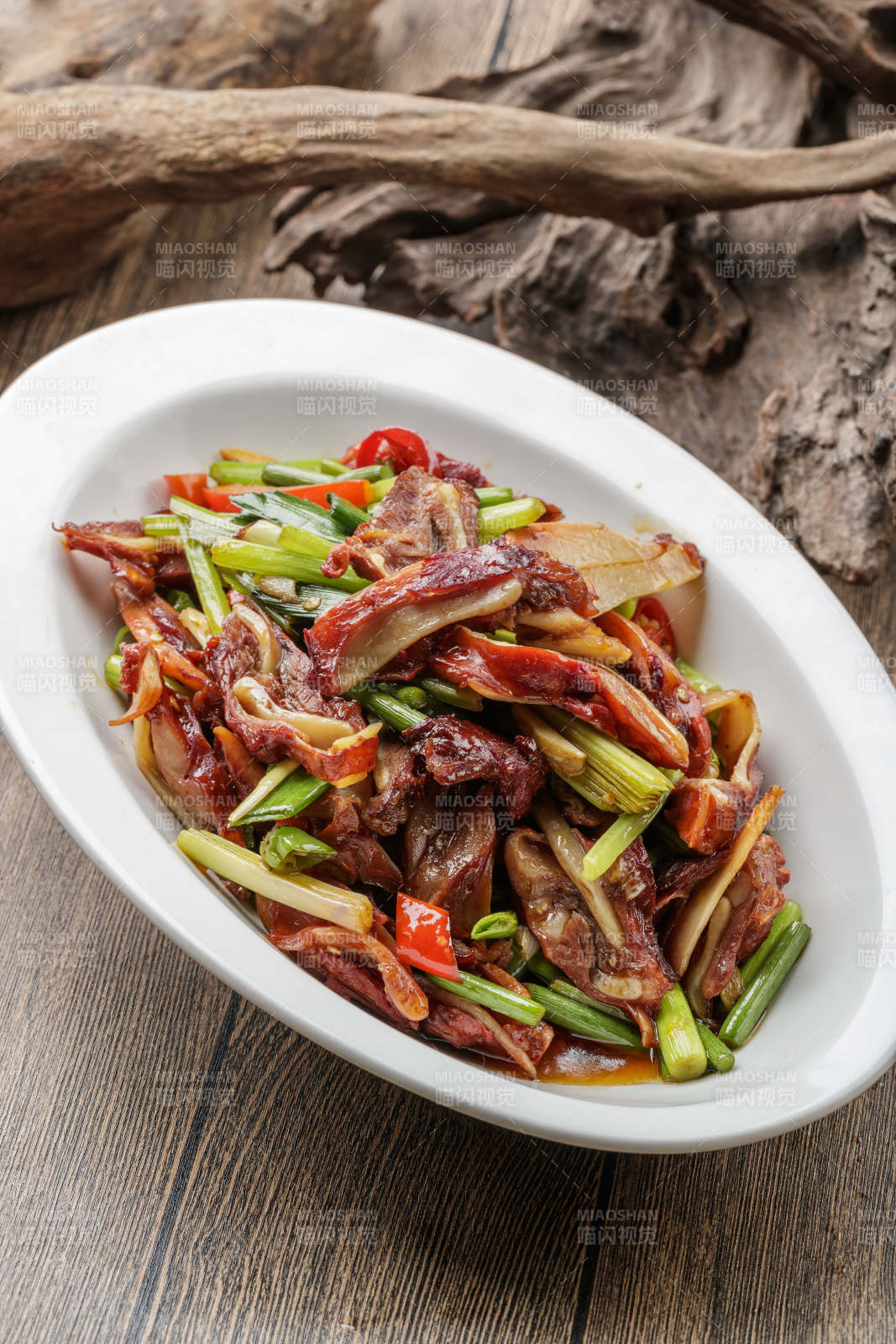 西芹香炒猪头肉图片