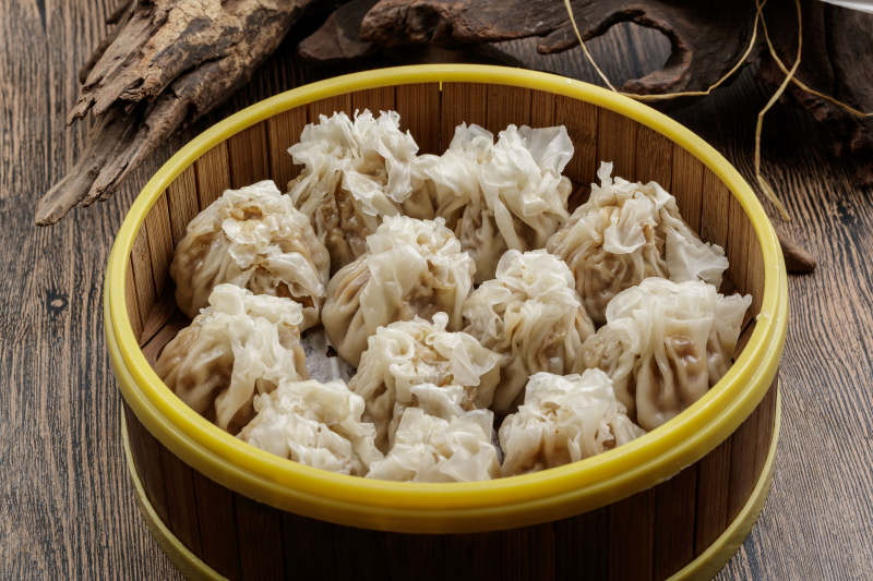 竹笼屉装的都一处烧麦图片