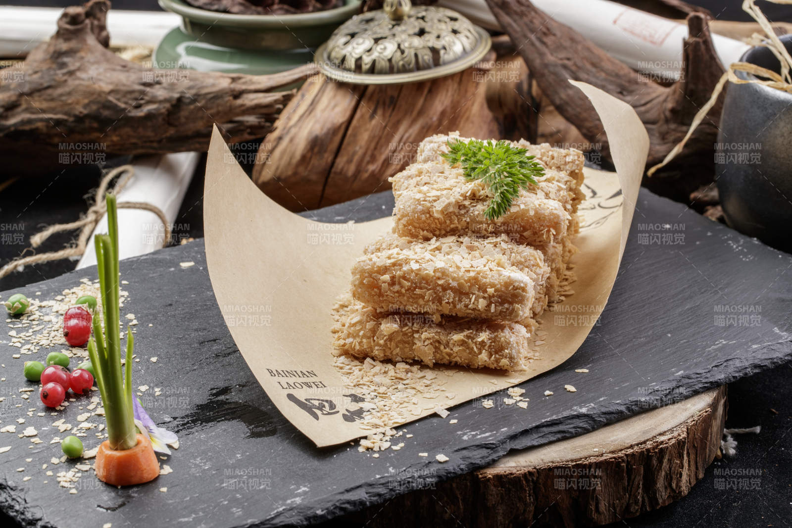 黑石板装的麻仁芋头麻仁红薯图片