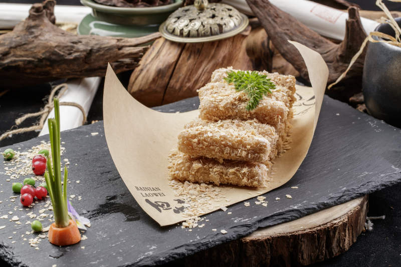 黑石板装的麻仁芋头麻仁红薯图片