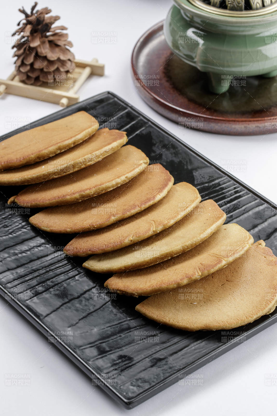 黑色石盘装的家常滩簧图片