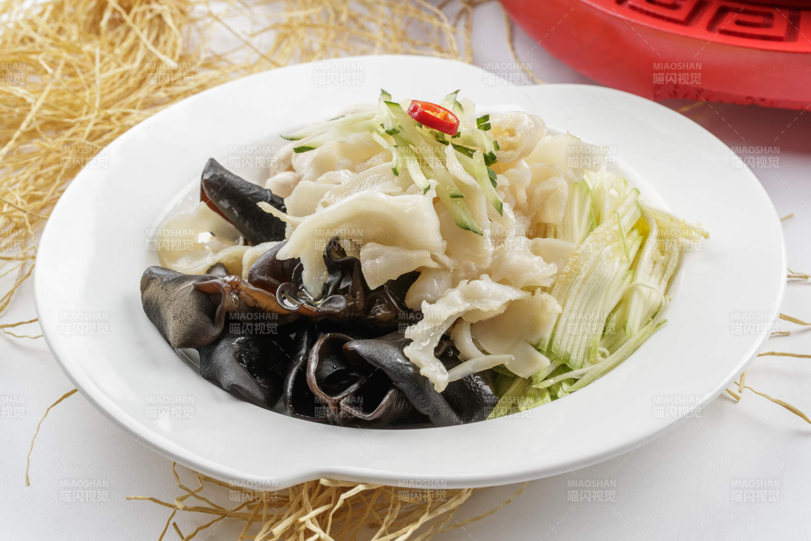 凉拌螺片木耳金针菇海鲜菇西芹丝图片