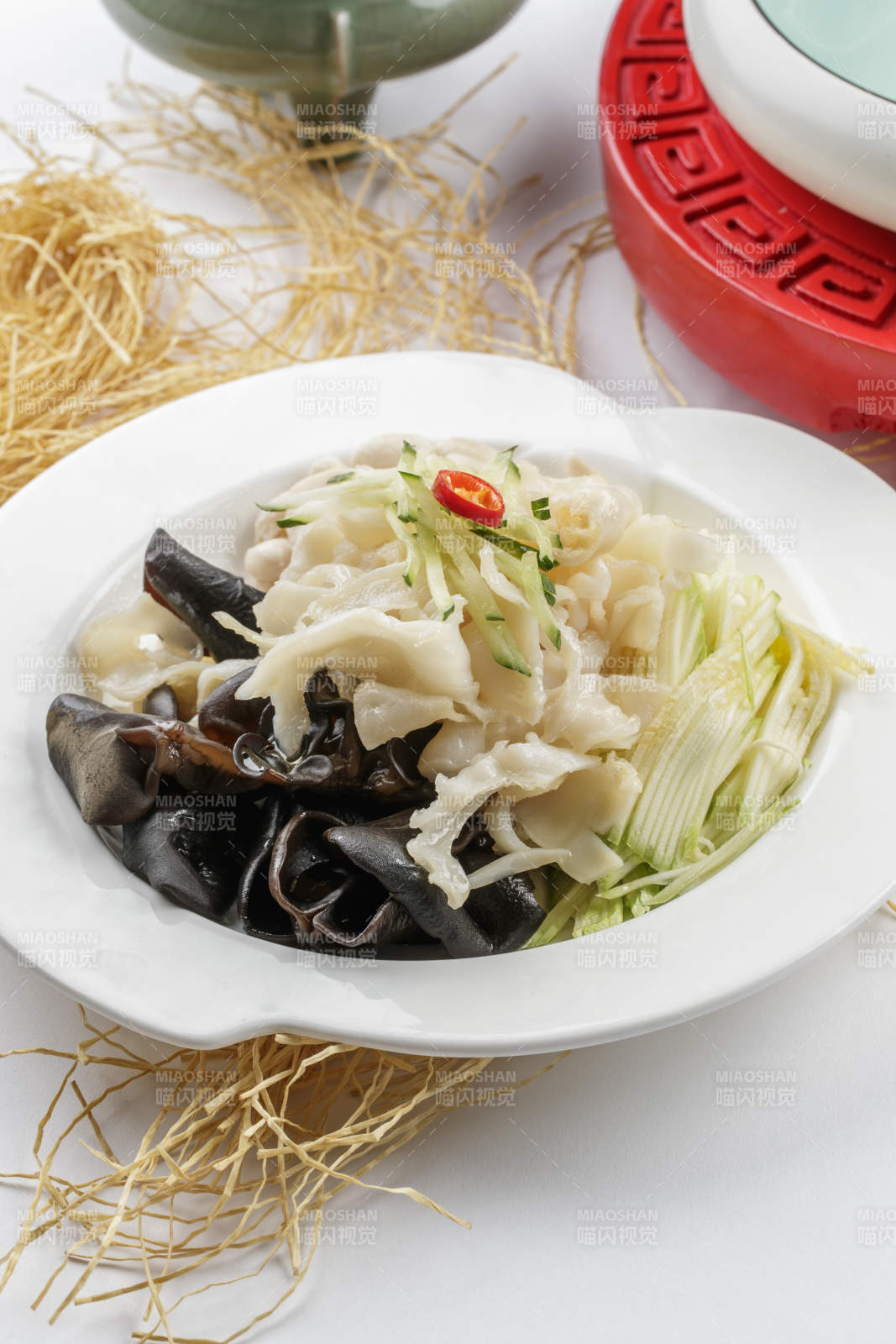 凉拌螺片木耳金针菇海鲜菇西芹丝图片